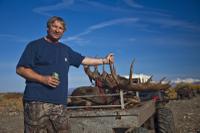 Hunter Waiting for Caribous